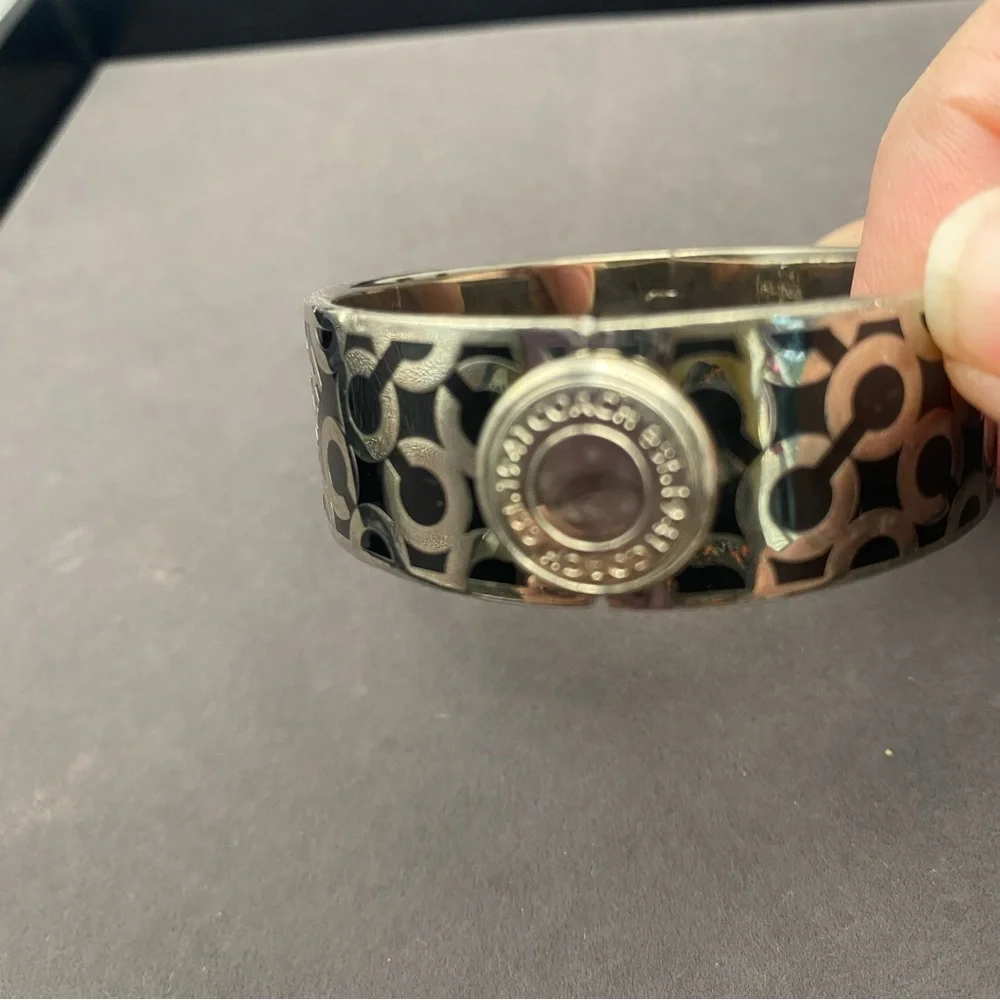 Coach Silver-Tone Black Logo Hinged Bangle Bracelet